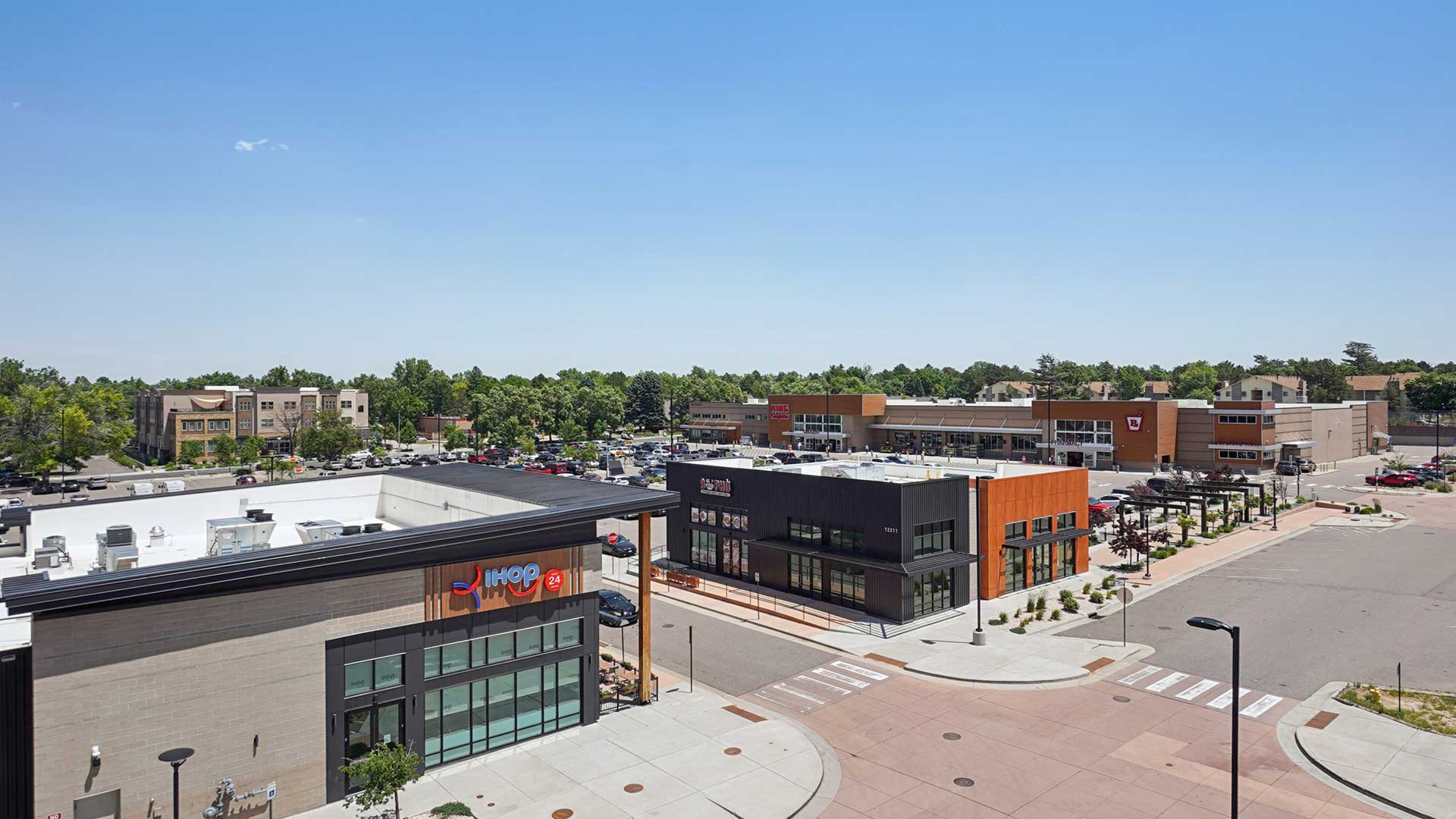 Retail shops, restaurants, and walkable neighborhood conveniences near Tempo at Nine Mile apartments in Southeast Denver.